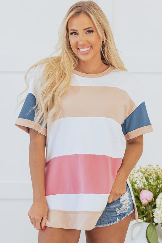 Flattering fit silhouette
  Vibrant and striking colorblock design
  Drop shoulder design for a laid
  back touch
  Side split detail for ease of movement
Material: 65% Polyester 35% Cotton