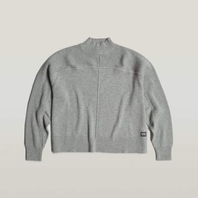 Ribbed mock neck. Shoulder panel proceeds in upper arm panel. Ribbed cuffs and waist. Vertical stripe in 3D at the front and back. Woven G-Star Originals label at the lower front. Zip closure. Boxy Jumper Mock offers a relaxed, loose fit in a shorter length. The ribbed section on the shoulder proceeds in an upper arm panel. The 3D stripe at the front and back adds interest. 95% Cotton, 5% Cashmere. Built-in stretch. Loose