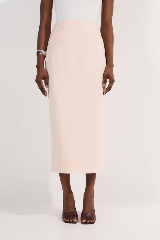 This Karen Millen tailored midi pencil skirt offers the perfect balance of sophistication and practicality for your everyday wardrobe. The compact stretch fabric moulds to your silhouette whilst ensuring all-day comfort and ease of movement. Style with a crisp sleeveless top and strappy sandals for a refined daytime look, or pair with a structured blazer for an effortlessly stylish ensemble perfect for family gatherings or lunch with friends. The functional pocket detail adds a contemporary touch to this timeless piece, whilst the below-knee length creates a flattering line that works brilliantly with both flats and low heels. This versatile skirt can be dressed down with a casual knit and trainers for weekend brunches or styled with a silk blouse for more polished daywear occasions.  Sleek midi pencil skirt Practical side pocket detail Elegant midi length Versatile design