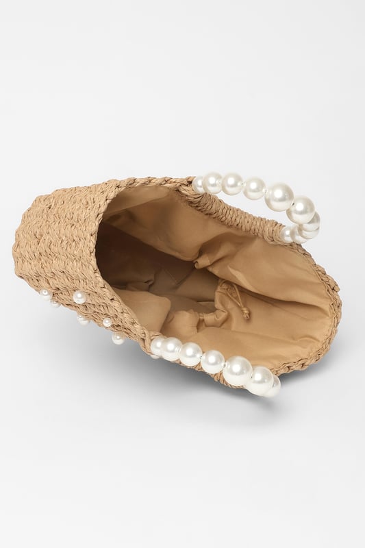 - Woven finish - Pearl details - Top handle - Lined - Exterior: 100% paper; excluding trims - Lining: 100% polyester