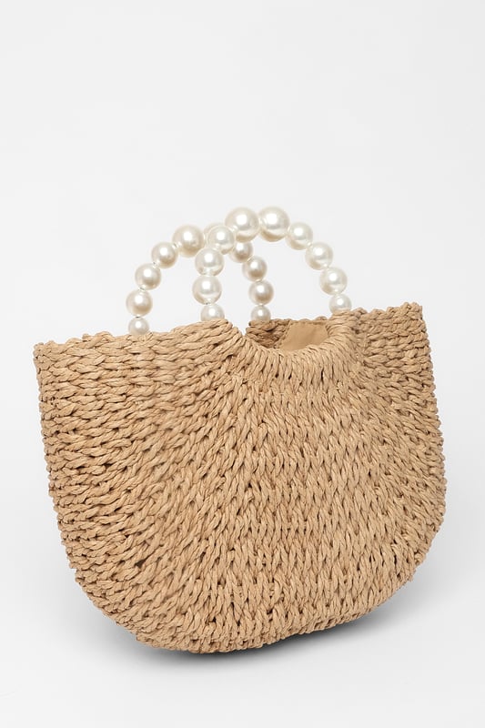 - Woven finish - Pearl details - Top handle - Lined - Exterior: 100% paper; excluding trims - Lining: 100% polyester