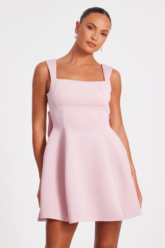 - Square neck - Large bow detail - Low back - Skate style - Model height: 5'6" - Model wears uk 8 / us 4 / eur 36 - Always check the wash care label - Cool hand wash with mild detergent