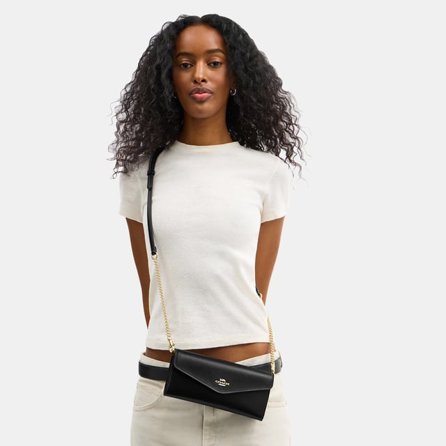 Klare Wallet with Chain in Refined Box Calf, Six credit card slots
 Full-length bill compartment
 Inside zip pocket, Outside open pocket,  Length: 21.00 cm,  Width: 2.50 cm,  Height: 10.50 cm