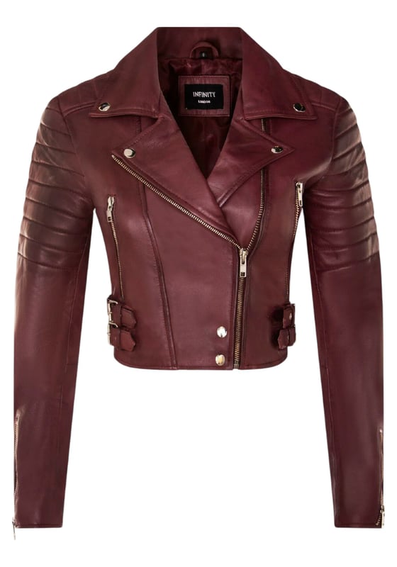 Indulge in sleek luxury with this cropped Brando-style leather jacket. Crafted from ultra-soft lamb nappa leather and lined with premium satin, it blends timeless biker attitude with modern elegance. Sophisticated detailing and a flattering silhouette make it a versatile essential for every fashion-forward wardrobe.

Key Features:
Soft and supple lamb nappa leather
Premium polyester inner lining for comfort
Cropped fit for a chic, flattering look
Classic Brando-style notched lapel
Off-centered YKK zip front fastening
Stylish quilted shoulders for a distinctive edge
2 outer extended vertical zipped pockets
Zipped cuffs – roll them up for a custom look
Buckle-adjustable side belts for a tailored fit