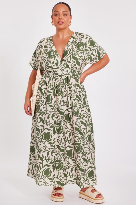 - Tropical print - V-neck - Wrap front look - Ruched waistline - Model height: 5'6" - Model wears uk 18 / us 14 / eur 46 - Always check the wash care label - Cool hand wash with mild detergent