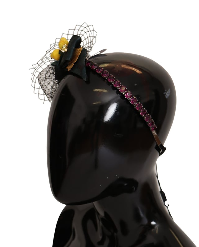 100% Authentic Dolce & Gabbana headband diadem tiara
  Black base with multicolor lemon embellishments
  Made from a luxurious blend of materials
  Adorned with purple crystals
  One size fits all
  Logo details
  Made in Italy