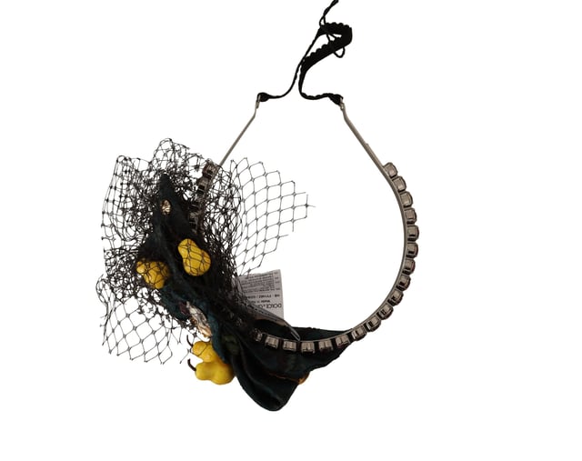 100% Authentic Dolce & Gabbana headband diadem tiara
  Black base with multicolor lemon embellishments
  Made from a luxurious blend of materials
  Adorned with purple crystals
  One size fits all
  Logo details
  Made in Italy