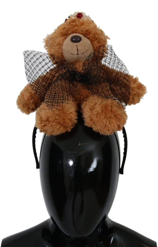 Stunning Dolce & Gabbana Teddy Bear Crystal Crown Hair Band
  100% Authentic and brand new with tags
  Brown color with gold metal detailing
  Crown adorned with red crystals
  Made from 80% PL 5% Crystal and 15% Brass
  One size fits all
  Dolce & Gabbana logo details
  Made in Italy
  Very exclusive and rare item
Material: 80% PL 5% Crystal 15% Brass