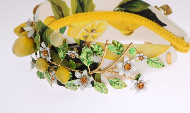Brand: Dolce & Gabbana
  Headband diadem tiara
  Color: Yellow and white multicolor
  Motive: Lemons Sicily
  Material: 40% Cotton 20% Crystal 40% Brass
  Crystals: Orange
  Perfect for women