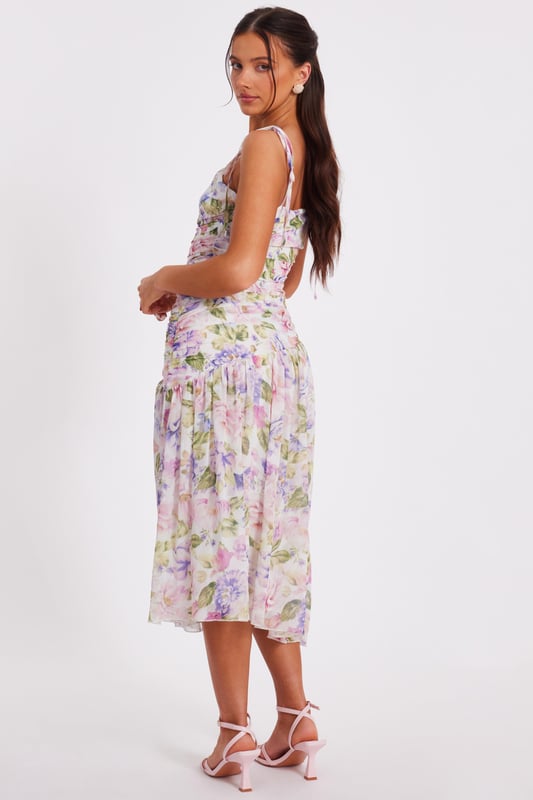 - Chiffon finish - Floral print - Ruched bodice - Drop waist look - Asymmetric waistline - Tie straps - Model height: 5'3" - Model wears uk 8 / us 4 / eur 36 - Always check the wash care label - Cool hand wash with mild detergent