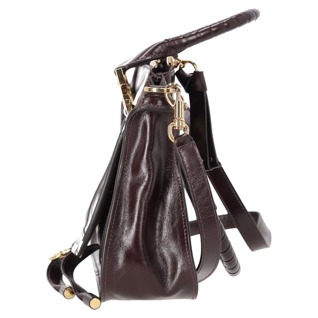 VINTAGE, RRP AS NEW
The Small Marcie Bag by Chloé is a graceful blend of structure and softness, crafted from luxurious shiny burgundy calfskin. Its gently slouched silhouette is accented with intricate saddle stitching, signature gold-tone hardware, and hand-wrapped double handles. The flap is secured with the line’s signature leather tassels, adding a touch of free-spirited charm to a refined classic.


Chloé Small Marcie Bag in Shiny Burgundy Leather
Condition: Very good
Signs of wear: No retail tag, No visible sign of wear., Lightly used but very well maintained. Minor creasing, light worn corners, light scratches.
Packaging: Dust bag
Color: Red | burgundy
Material: Leather | ] leather
Size: One Size | One Size
Measurements: Width: 90; Height: 220; Length: 310; Handle drop: 150; Strap length: 940
SKU: NAPPUDEBA527519W
