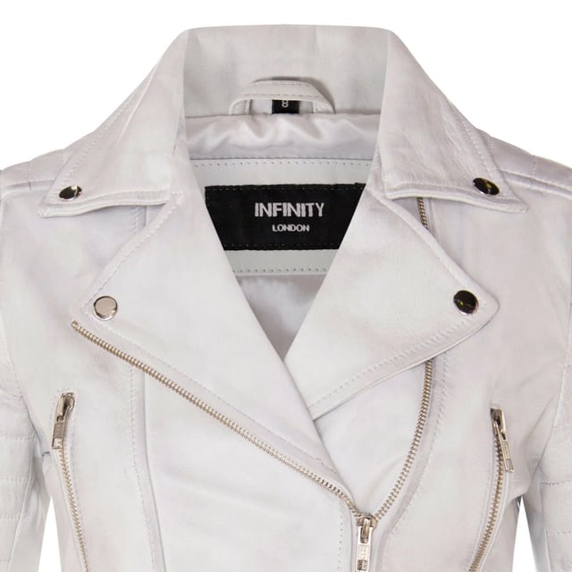 Indulge in sleek luxury with this cropped Brando-style leather jacket. Crafted from ultra-soft lamb nappa leather and lined with premium satin, it blends timeless biker attitude with modern elegance. Sophisticated detailing and a flattering silhouette make it a versatile essential for every fashion-forward wardrobe.

Key Features:
Soft and supple lamb nappa leather
Premium polyester inner lining for comfort
Cropped fit for a chic, flattering look
Classic Brando-style notched lapel
Off-centered YKK zip front fastening
Stylish quilted shoulders for a distinctive edge
2 outer extended vertical zipped pockets
Zipped cuffs – roll them up for a custom look
Buckle-adjustable side belts for a tailored fit