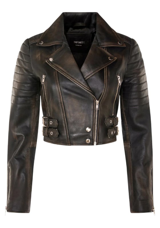 Indulge in sleek luxury with this cropped Brando-style leather jacket. Crafted from ultra-soft lamb nappa leather and lined with premium satin, it blends timeless biker attitude with modern elegance. Sophisticated detailing and a flattering silhouette make it a versatile essential for every fashion-forward wardrobe.

Key Features:
Soft and supple lamb nappa leather
Premium polyester inner lining for comfort
Cropped fit for a chic, flattering look
Classic Brando-style notched lapel
Off-centered YKK zip front fastening
Stylish quilted shoulders for a distinctive edge
2 outer extended vertical zipped pockets
Zipped cuffs – roll them up for a custom look
Buckle-adjustable side belts for a tailored fit