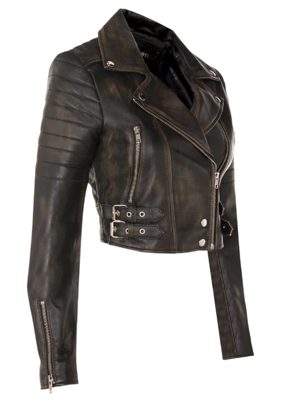 Indulge in sleek luxury with this cropped Brando-style leather jacket. Crafted from ultra-soft lamb nappa leather and lined with premium satin, it blends timeless biker attitude with modern elegance. Sophisticated detailing and a flattering silhouette make it a versatile essential for every fashion-forward wardrobe.

Key Features:
Soft and supple lamb nappa leather
Premium polyester inner lining for comfort
Cropped fit for a chic, flattering look
Classic Brando-style notched lapel
Off-centered YKK zip front fastening
Stylish quilted shoulders for a distinctive edge
2 outer extended vertical zipped pockets
Zipped cuffs – roll them up for a custom look
Buckle-adjustable side belts for a tailored fit