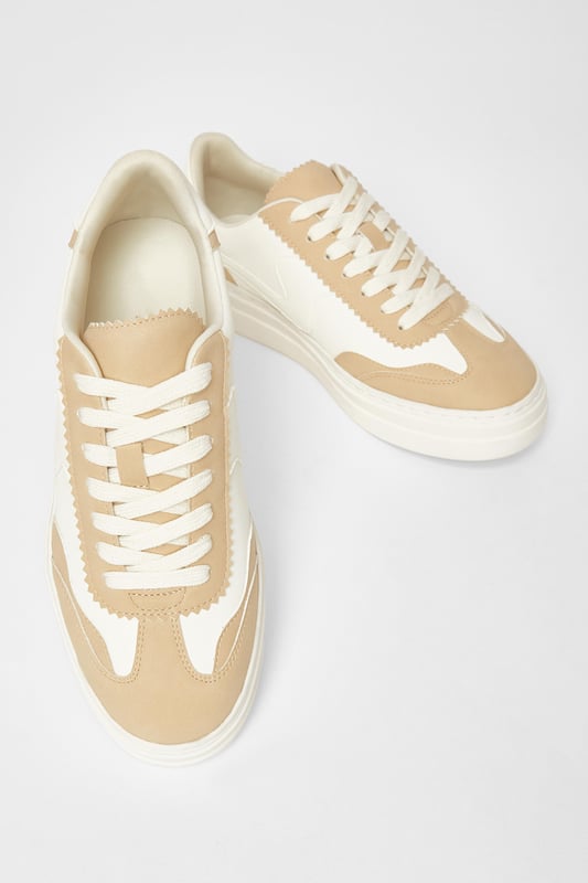 - Faux leather finish - Lace up style - Chunky sole - Wipe clean