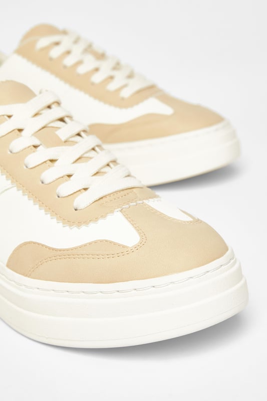 - Faux leather finish - Lace up style - Chunky sole - Wipe clean