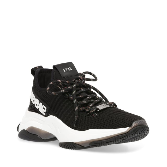 If you only rock one trainer this season  make it MAXILLA-R-E. A super-sleek monochromatic color palette unites this kick’s defining features  which range from a texture-blocked knit upper to an artfully sculpted sole and glitzy rhinestone embellishment.