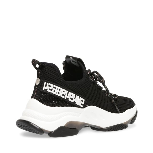 If you only rock one trainer this season  make it MAXILLA-R-E. A super-sleek monochromatic color palette unites this kick’s defining features  which range from a texture-blocked knit upper to an artfully sculpted sole and glitzy rhinestone embellishment.