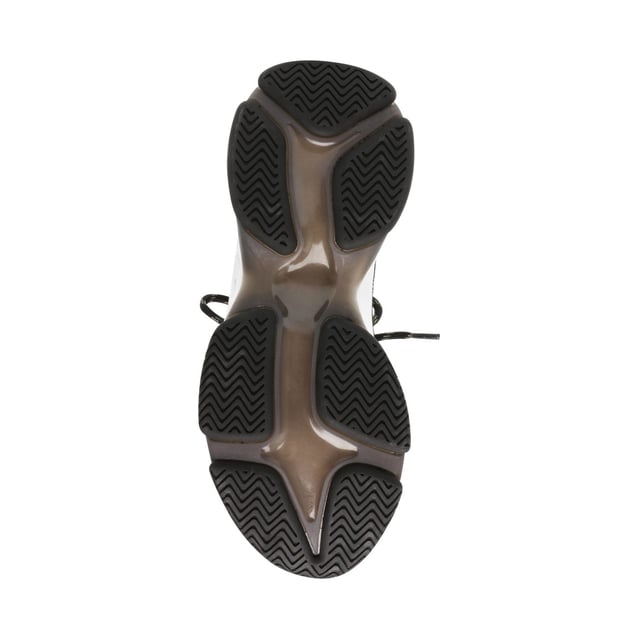 If you only rock one trainer this season  make it MAXILLA-R-E. A super-sleek monochromatic color palette unites this kick’s defining features  which range from a texture-blocked knit upper to an artfully sculpted sole and glitzy rhinestone embellishment.