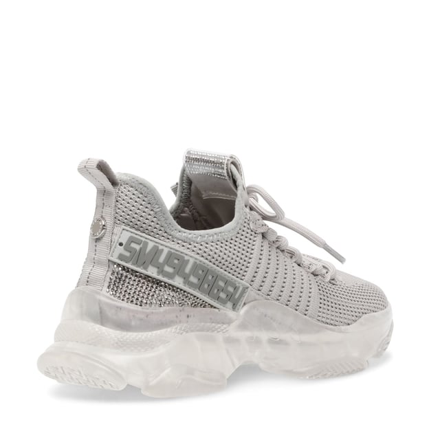 If you only rock one trainer this season  make it MAXILLA-R-E. A super-sleek monochromatic color palette unites this kick’s defining features  which range from a texture-blocked knit upper to an artfully sculpted sole and glitzy rhinestone embellishment.
