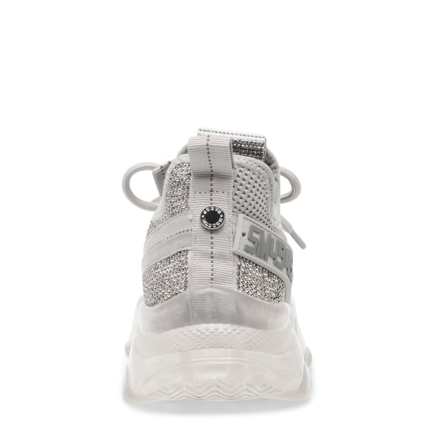 If you only rock one trainer this season  make it MAXILLA-R-E. A super-sleek monochromatic color palette unites this kick’s defining features  which range from a texture-blocked knit upper to an artfully sculpted sole and glitzy rhinestone embellishment.