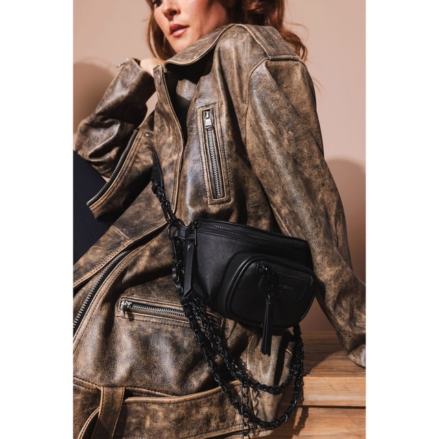 Man-made material.Zipper fastening.Black shoulder strap and multiple chains.Steve Madden branding.