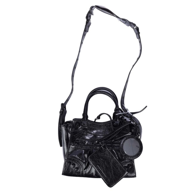 One zip pocket on the front.Zip pocket on the back.Closes with two-way zipper.Two handles.Removable and adjustable shoulder strap.Detachable pendant.Separate case.Inside:One main compartment.One zip pocket.One slip pocket.Separate case.