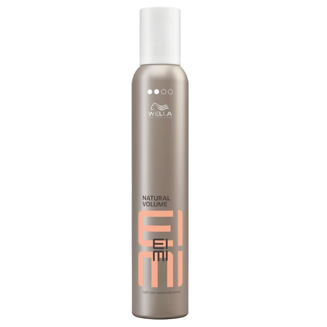 Elevate your hair care routine with Wella EIMI Natural Volume Mousse, designed for professional styling. This 300ml mousse provides exceptional volume and a soft, refined hold, perfect for achieving that natural look. Enriched with protective ingredients, it helps shield your hair from dehydration during blow drying. For best results, shake the canister well, then apply evenly from roots to ends on damp hair before blow drying. Experience beautiful, voluminous hair with Wella's trusted expertise in hair care.