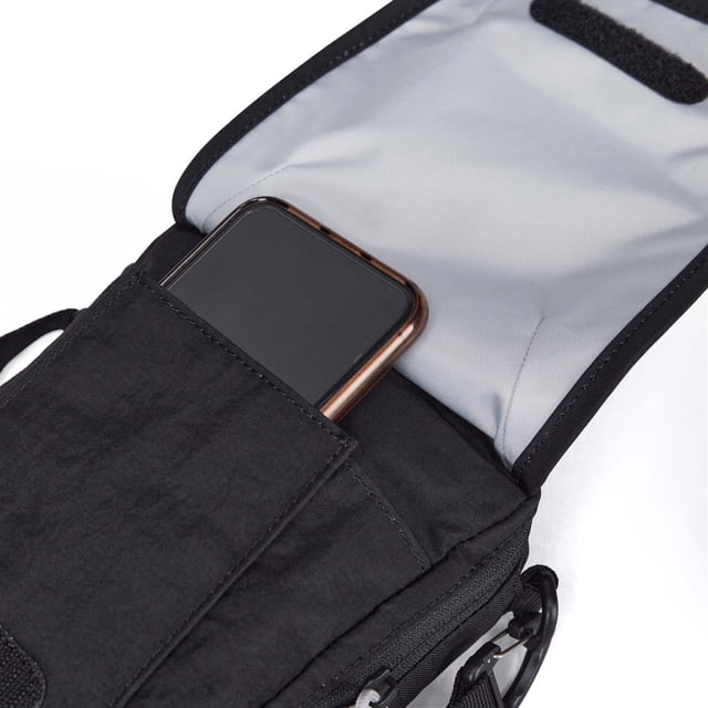 Keep your essentials within reach with the Xodus. Wear it year-round  one of three ways. The Xodus X-Body Large is a versatile and convenient carry-all for valuables and small items.Zipped main compartment.Front velcro closure.