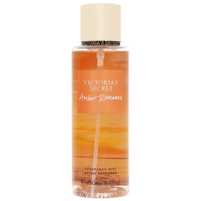 Discover the enchanting allure of Victoria's Secret Amber Romance Fragrance Mist. This luxurious sheer mist is perfect for layering with other fragrances, allowing you to create a personalized scent that reflects your unique style. Infused with the warm notes of amber and the creamy sweetness of crème anglaise, this fragrance mist is designed to elevate your daily routine. Ideal for women who appreciate a blend of sophistication and warmth, it's a must-have addition to your beauty collection.
