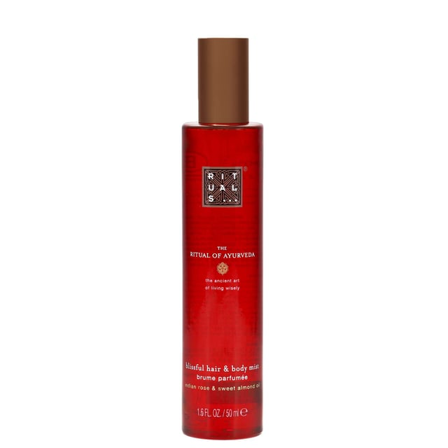 Experience tranquility and balance with Rituals The Ritual of Ayurveda Blissful Hair and Body Mist. This revitalizing mist combines the enchanting aromas of Indian rose and sweet almond oil, creating a harmonious blend that soothes your senses. Perfect for hair, skin, or fabrics, this luxurious mist not only refreshes but also promotes a sense of well-being. Ideal for women seeking a moment of calm in their daily routine. Elevate your self-care ritual and indulge in the essence of Ayurveda.