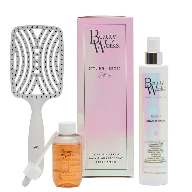 Discover the Beauty Works Styling Heroes Gift Set, your ultimate solution for radiant, healthy hair. This luxurious set includes three essential products: the Beauty Works Detangling Brush, 10-in-1 Miracle Spray (250ml), and Argan Serum (90ml). The detangling brush glides through hair, while the Miracle Spray nourishes and protects against heat damage. The Argan Serum locks in hydration and enhances shine. Elevate your hair care routine with this must-have set!