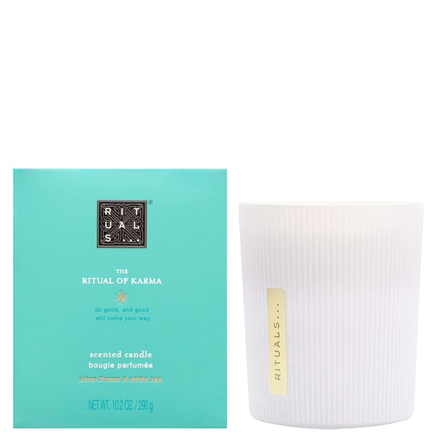 Transform your space with the Rituals Karma Scented Candle, a 290g delight that infuses your home with positive energy. This invigorating candle features a bright blend of bergamot and lemon, enhanced by the cheerful notes of orange flower and lilac, creating an atmosphere of joy and well-being. Enjoy up to 50 hours of burn time, making it perfect for any occasion. Vegan-friendly, this candle is a wonderful addition to your home decor. Remember to never leave burning candles unattended and keep them away from children and pets.