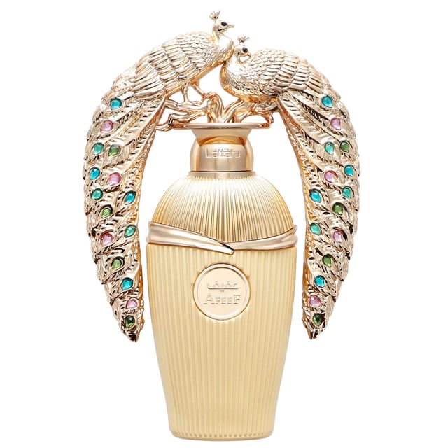 Discover the enchanting Lattafa Afeef Eau de Parfum Spray, a captivating unisex fragrance that balances fresh, floral, and warm notes. This scent opens with a burst of bergamot, pink pepper, and peach. At its heart lies a bouquet of jasmine, orange flower, and tuberose, creating a sophisticated floral experience. The fragrance settles into a warm base of sandalwood, amber, and patchouli, leaving a lasting impression. Ideal for any occasion, this 100ml perfume is your perfect companion.