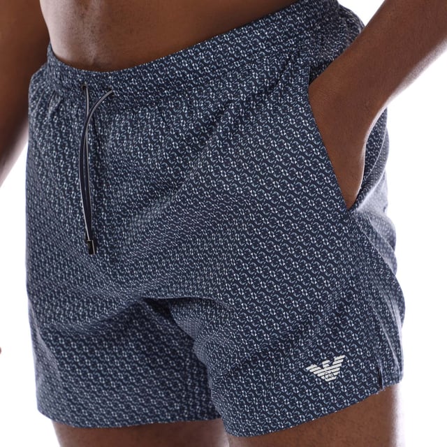 Mens Woven Armani Swim Shorts in blue.- Elasticated drawstring waistband.- Side pockets.- Back pocket.- Regular fit.- 100% Polyester.- Ref: 2117400P465535