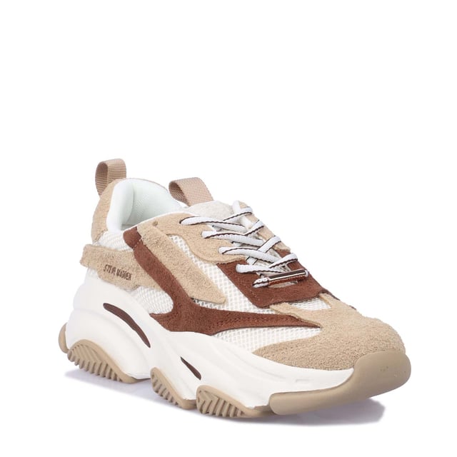 Steve Madden launch an exclusive colourway of the Possession trainers to schuh! These chunky trainers boast a beige  white and warm brown colourway and feature panelled leather and fabric uppers for a layered look.