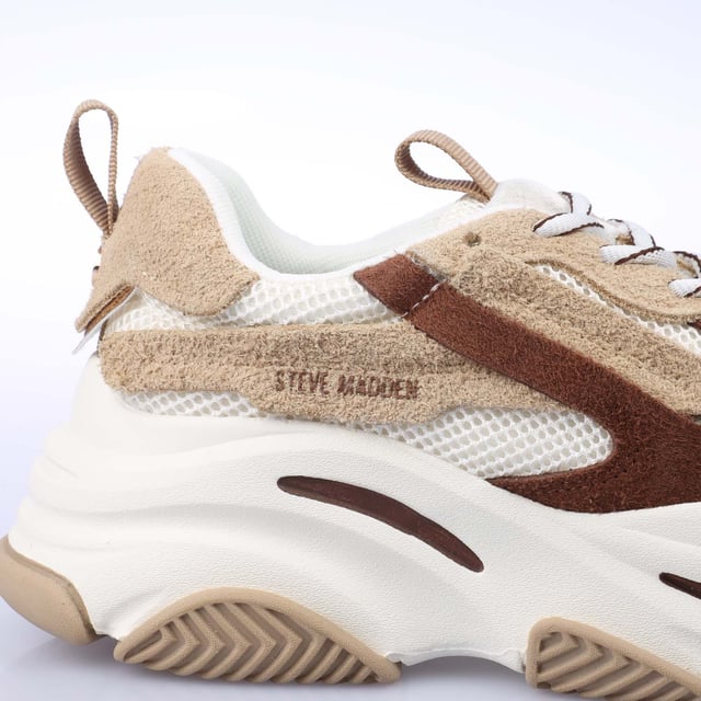 Steve Madden launch an exclusive colourway of the Possession trainers to schuh! These chunky trainers boast a beige  white and warm brown colourway and feature panelled leather and fabric uppers for a layered look.