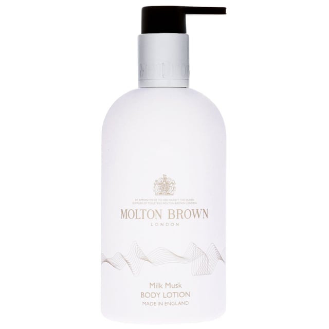 Experience luxurious hydration with Molton Brown Milk Musk Body Lotion. This exquisite body lotion not only nourishes your skin, leaving it smooth and deeply moisturized, but also envelops you in a delightful milky fragrance. The scent opens with fresh notes of succulent pear and peach, leading to a heart of soft musk, creamy milk, vanilla, and ambroxan. The base features warm white cedarwood and tonka bean, creating a comforting aroma. Ideal for daily use, simply apply and massage into your skin for a pampering treat. Molton Brown is proud to be a cruelty-free brand.
