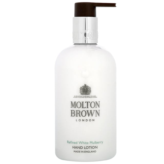 Indulge your hands with the luxurious Molton Brown Refined White Mulberry Hand Lotion. This unisex moisturising lotion features a refreshing aromatic fragrance that begins with the crisp essence of fresh basil, transitioning into a heart of aromatic thyme, and finishing with the soothing notes of clary sage. Perfect for daily use, this cruelty-free hand lotion not only hydrates but also leaves your skin delicately scented. Ideal for all skin types, treat yourself or a loved one to the elegance of Molton Brown.