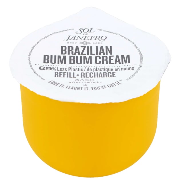Revitalize your skin with Sol de Janeiro's Brazilian Bum Bum Cream Refill, specially formulated to enhance your curves. This luxurious cream features fast-absorbing cupuaçu butter for deep hydration, essential fatty acids for a silky smooth finish, and powerful antioxidants from guaraná extract and açaí oil that protect against environmental stressors. Enriched with Brazil nut oil for added nourishment, this cream leaves your skin glowing and radiant. Experience the irresistible Cheirosa '62 fragrance, a delicious blend of pistachio, salted caramel, and vanilla. Ideal for all skin types, this vegan, cruelty-free, gluten-free, and paraben-free cream is perfect for use on the bum, legs, tummy, arms, and more. Pamper yourself with the ultimate body care solution!