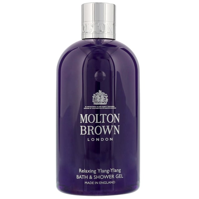 Indulge in the luxurious Molton Brown Ylang-Ylang Relaxing Bath & Shower Gel. Infused with a soothing blend of tangerine, cardamom, and ginger, this gel transforms your bathing experience. The heart of ylang-ylang, jasmine, and rose absolute envelops you in serenity, while the warm base notes of vanilla, cedarwood, and musk leave your skin delicately scented. Perfect for women who appreciate cruelty-free products, this 300ml gel is a must-have for your bath and body collection. Elevate your self-care routine with this exquisite shower gel.