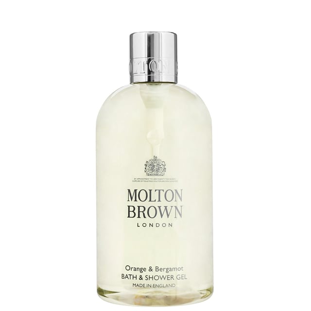 Molton Brown Orange & Bergamot Bath & Shower Gel - 300ml Experience the invigorating sensation of Molton Brown's Orange & Bergamot Bath & Shower Gel. This luxurious gel cleanses and revitalizes your skin, leaving it feeling refreshed and delicately scented. Infused with a harmonious blend of orange, bergamot, mandarin, neroli, cardamom, galbanum, musk, ylang-ylang, and cedarwood, it transforms your bathing ritual into a spa-like experience. Ideal for all skin types, this cruelty-free product is perfect for anyone seeking a touch of luxury in their daily routine.