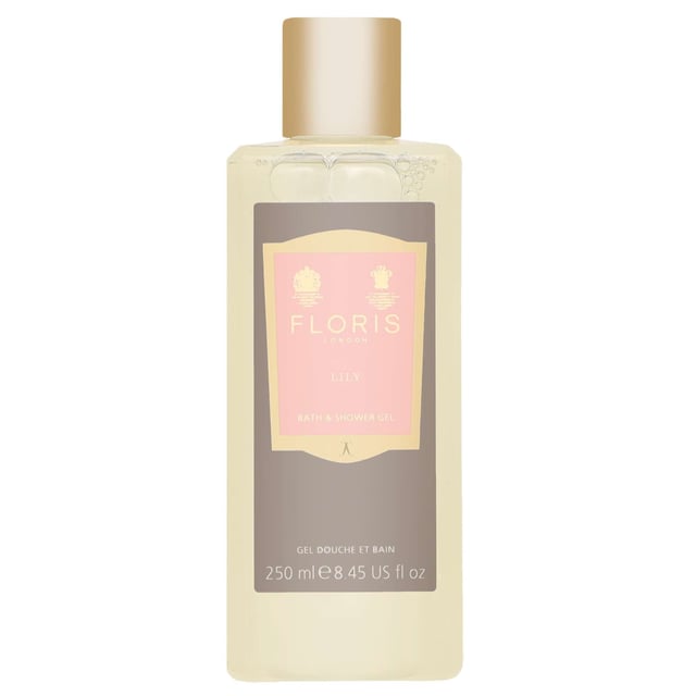 Experience the refreshing and romantic essence of Floris London Lily Bath & Shower Gel. This luxurious gel envelops your skin in a delicate floral fragrance, combining notes of white tea and aquatic dew at the top, with a heart of lily-of-the-valley, Bulgarian rose, and ylang ylang. The scent is grounded by a comforting base of cedar and musk, creating a perfectly balanced aroma. Ideal for women seeking a rejuvenating bath experience, this 250ml shower gel is a must-have addition to your bath and body routine.