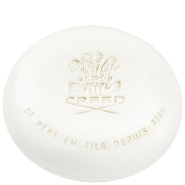 Experience the essence of sophistication with Creed Aventus Luxury Perfumed Soap. Launched in 2010 to mark Creed's 250th anniversary, this soap embodies the spirit of a historic emperor with its bold fragrance. The top notes of blackcurrant, Italian bergamot, apple, and pineapple create a fresh and invigorating opening. The heart reveals earthy notes complemented by florals such as rose, jasmine, and patchouli, while the rich base of oak moss, ambergris, and vanilla leaves a lasting impression. Perfect for men seeking a touch of luxury in their grooming routine.