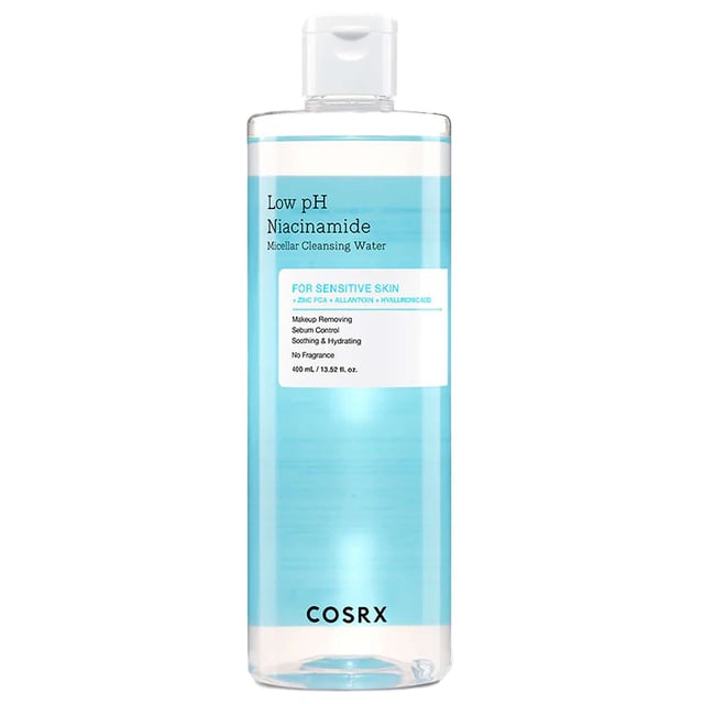 Experience gentle cleansing with Cosrx Low pH Niacinamide Micellar Cleansing Water. This 400ml makeup remover is perfect for sensitive skin, effortlessly cleansing while hydrating. Infused with niacinamide, it effectively removes makeup and excess oil, leaving your skin calm and refreshed. Ideal for a no-rinse routine or as part of a double cleansing regimen, it ensures a clear and balanced complexion. Plus, it's cruelty-free! To use, simply apply to a cotton pad and wipe across your skin for a clean and rejuvenated feel.