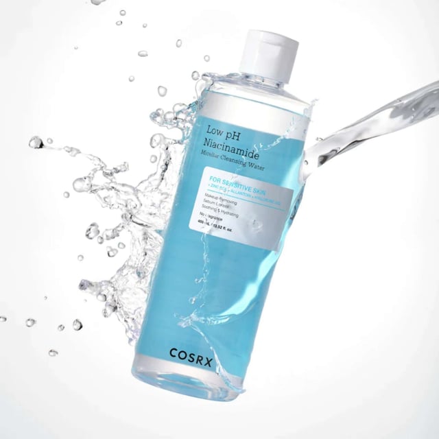 Experience gentle cleansing with Cosrx Low pH Niacinamide Micellar Cleansing Water. This 400ml makeup remover is perfect for sensitive skin, effortlessly cleansing while hydrating. Infused with niacinamide, it effectively removes makeup and excess oil, leaving your skin calm and refreshed. Ideal for a no-rinse routine or as part of a double cleansing regimen, it ensures a clear and balanced complexion. Plus, it's cruelty-free! To use, simply apply to a cotton pad and wipe across your skin for a clean and rejuvenated feel.