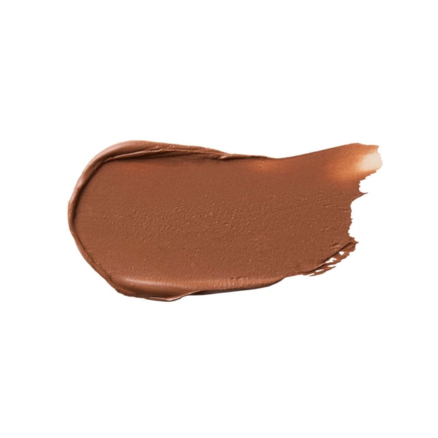 Experience the ultimate sun-kissed glow with Benefit Hoola Wave Medium Deep Cream Bronzer. This luxurious cream bronzer offers a buttery-soft texture that glides on effortlessly, delivering a natural finish that enhances your skin's radiance. Enriched with nourishing ingredients like jojoba seed oil, shea butter, and avocado oil, this bronzer not only provides a stunning bronzed look but also keeps your skin feeling soft and hydrated. With 12-hour longwear, waterproof, and smudge-proof features, it's perfect for any occasion. Available in various shades to suit every skin tone.