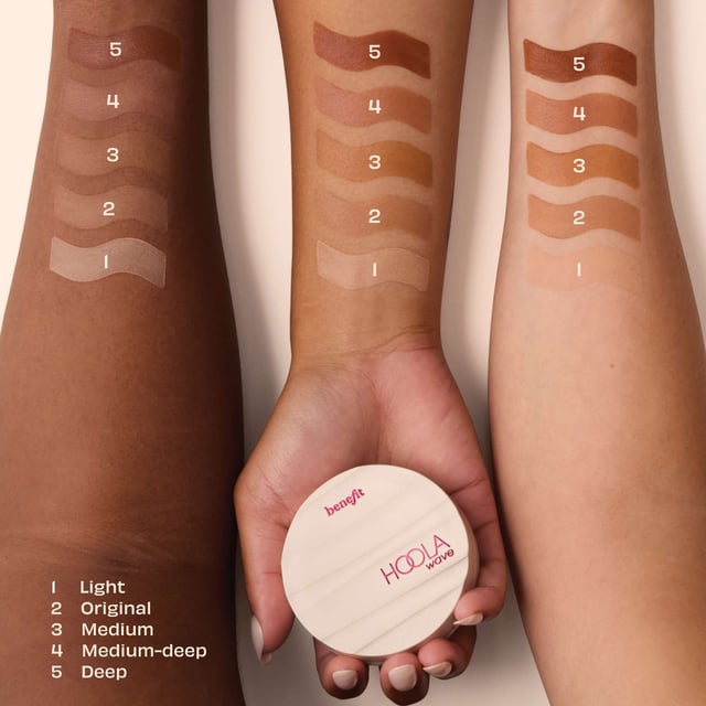 Experience the ultimate sun-kissed glow with Benefit Hoola Wave Medium Deep Cream Bronzer. This luxurious cream bronzer offers a buttery-soft texture that glides on effortlessly, delivering a natural finish that enhances your skin's radiance. Enriched with nourishing ingredients like jojoba seed oil, shea butter, and avocado oil, this bronzer not only provides a stunning bronzed look but also keeps your skin feeling soft and hydrated. With 12-hour longwear, waterproof, and smudge-proof features, it's perfect for any occasion. Available in various shades to suit every skin tone.