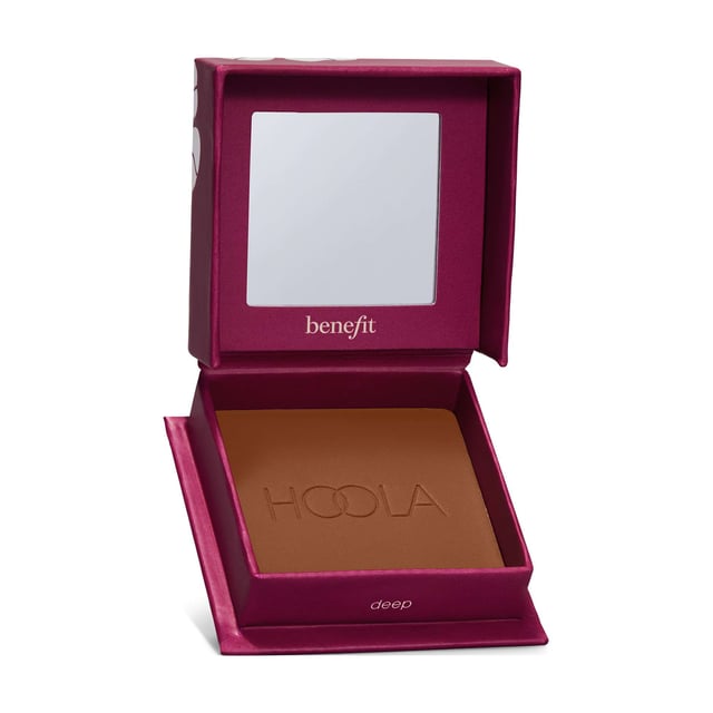 Discover the iconic Benefit Hoola Deep Matte Powder Bronzer, your go-to solution for achieving a radiant sun-kissed look all year round. This award-winning bronzer features an ultra-fine, silky-soft formula that effortlessly builds and blends to create a natural matte finish that lasts all day. Perfect for any occasion, it is waterproof, smudge-proof, and sweat-proof, ensuring your glow stays intact. With a range of shades to suit every skin tone, it's no wonder this bronzer is a best-seller in the US, UK, and Canada. Elevate your makeup routine with this must-have cosmetic essential.