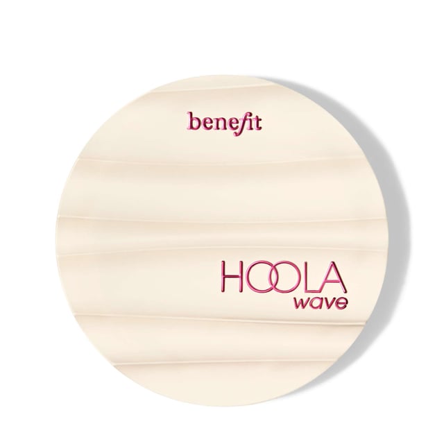 Transform your beauty routine with Benefit Hoola Wave Light Cream Bronzer. This luxurious cream bronzer gives you a sun-kissed glow without the need for a beach vacation. Its buttery-soft texture glides on effortlessly, blending seamlessly for a natural finish. Enriched with nourishing jojoba seed oil, shea butter, and avocado oil, it hydrates your skin while providing a long-lasting, waterproof, and smudge-proof formula. Available in multiple shades, this bronzer is perfect for any skin tone. Achieve a radiant, bronzed look that lasts up to 12 hours with Benefit Hoola Wave.